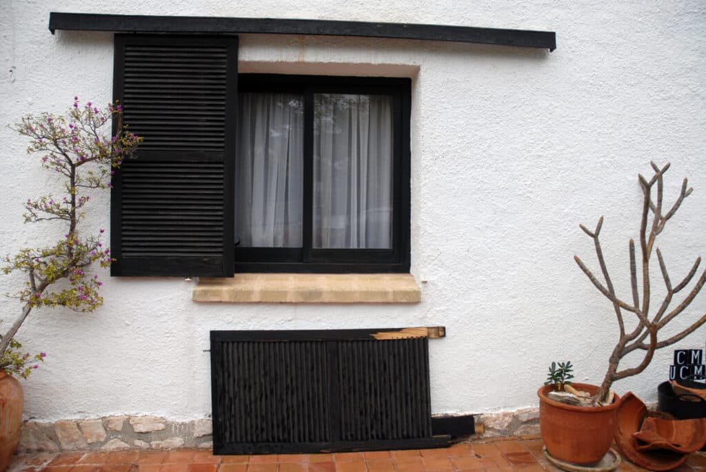 window shutters blown off by storm