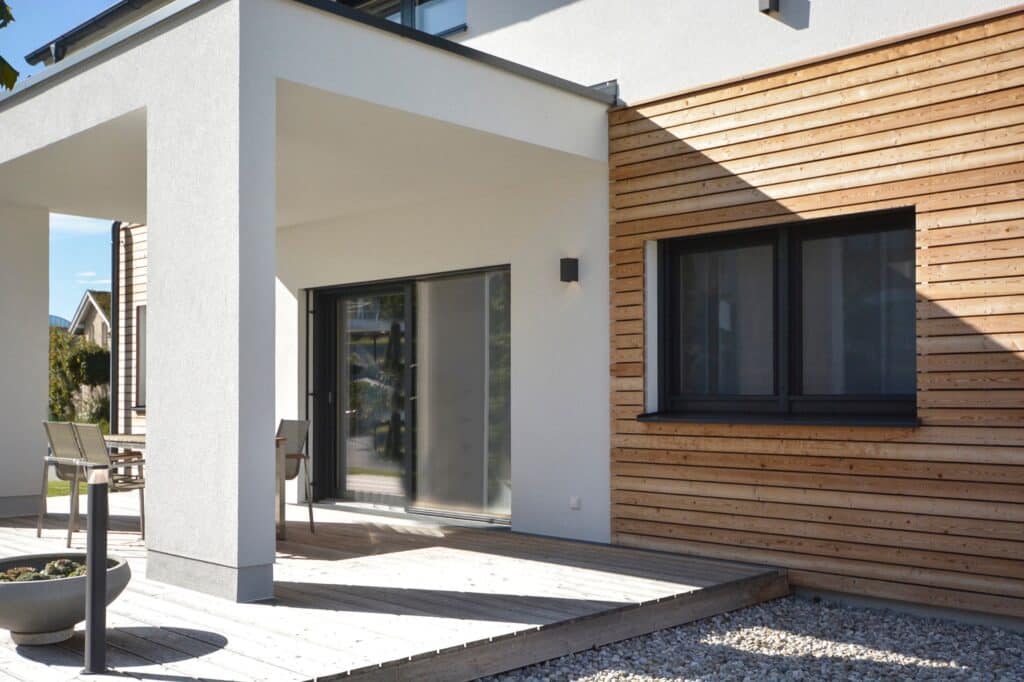 Modern,House,With,Wooden,Cladding,,White,Walls,,Windows,,Terrace,And
